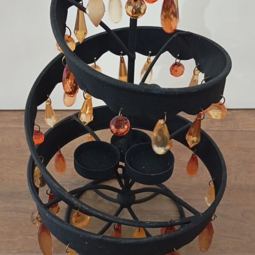 Black metal candle holder with 3 candle slots