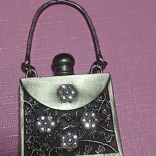 Vintage perfume bottle in Art Nouveau style, new