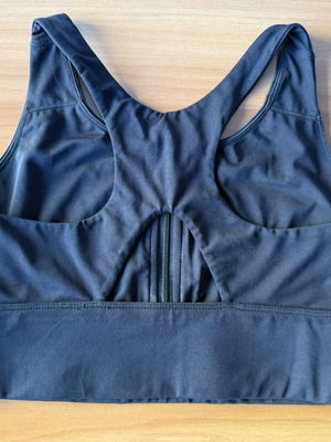 Energetics black sports bra with front zipper, racerback