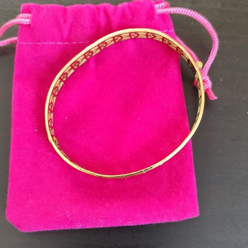 Gold stainless steel bracelet with unique design like new