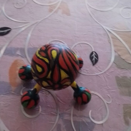 Wooden hand-painted massager