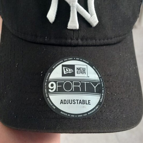 New Era adjustable black and white cap