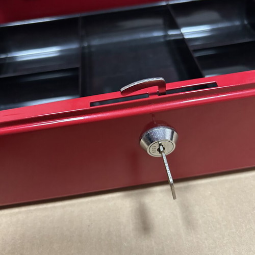 Red metal cash box with lock and key