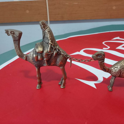 Antique brass paperweight caravan with camels and Bedouins like new