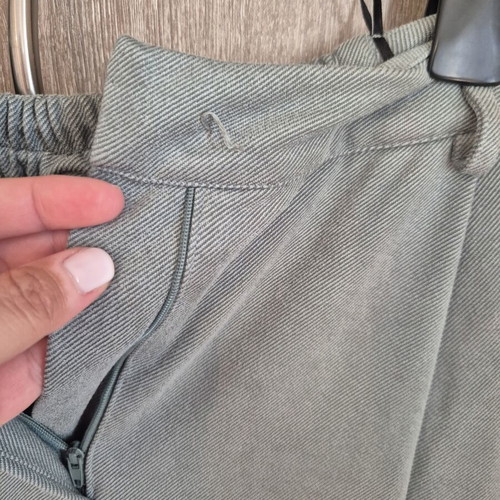 Helmi trouser size L loose fit baggy pistachio color button missing