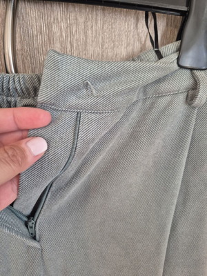 Helmi trouser size L loose fit baggy pistachio color button missing