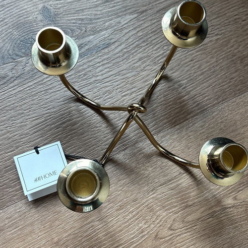 H&M Home gold metal four-arm candlestick