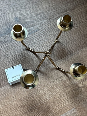 H&M Home gold metal four-arm candlestick