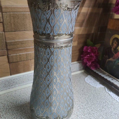 Vintage decorative vase used with silver-plated body and blue enamel