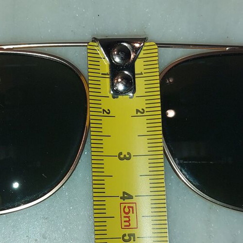 Clip On Sunglasses like new, gold color, no name