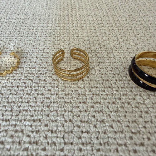 Steel rings like new, set of 5, gold color