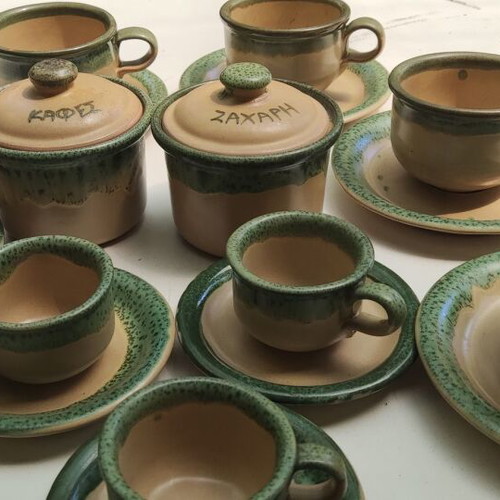 Clay tea and coffee set like new, 4 tea cups, 4 coffee cups, sugar and coffee containers, jug