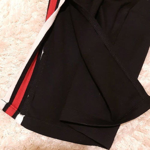 My Star women's pants Medium with stripes and side slit, like new, black-red