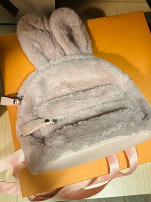 Furry bunny-shaped backpack like new pink