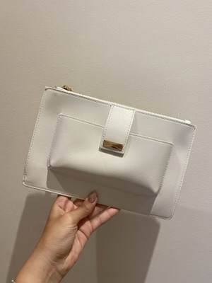 Clutch bag like new with front phone pocket, white