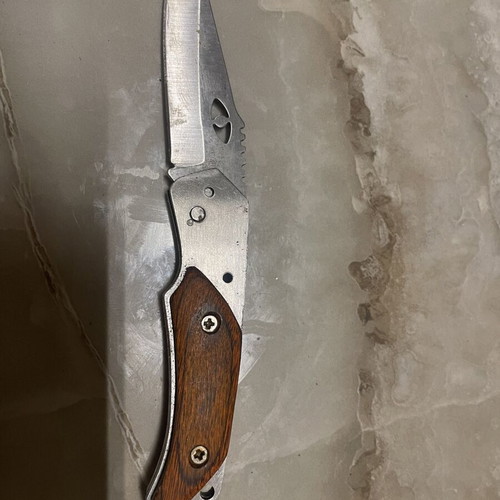 Folding Pocket Knife used, stainless steel blade with wooden handle