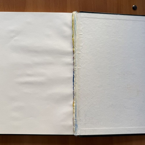 Black sketchbook with fabric cover, 127 sheets