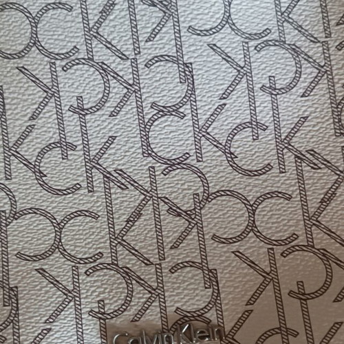 Calvin Klein white handbag and shoulder bag with CK logo