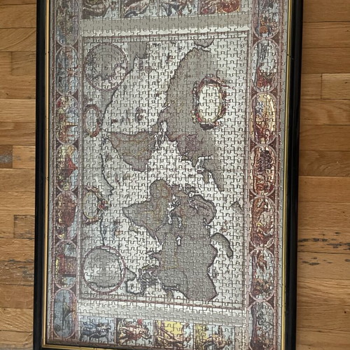Old collectible holographic puzzle in frame