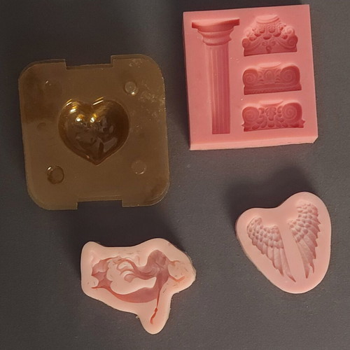 Set of 4 molds for plaster or clay, like new