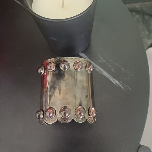 Metal cuff bracelet with decorative cabochon zirconia stones, used, black