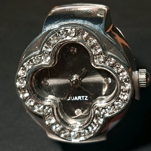 Four-leaf clover ring watch with crystals and black dial like new