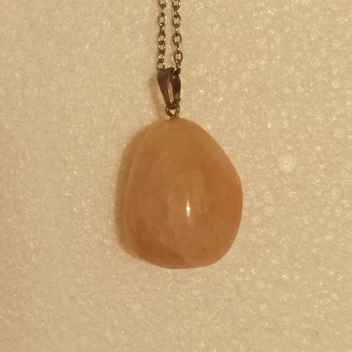 Semi-precious rose quartz pendant on silver chain like new