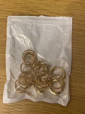Rings various types like new, gold-colored