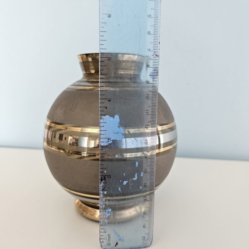 Decorative vase with gold details like new