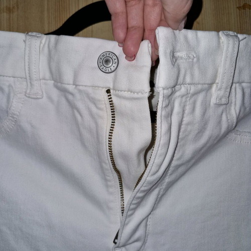 American Eagle white jeans like new, size L with asymmetric hem