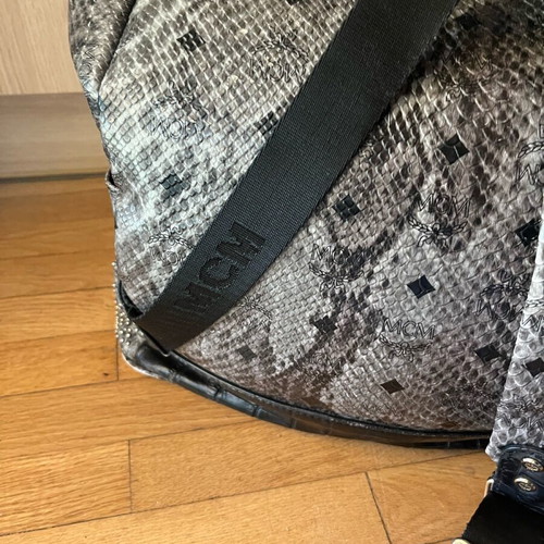 MCM Stark Python Print Backpack used, gray with studs
