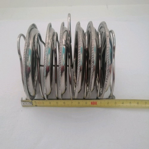 Vintage silver coaster set with elegant stand, like new