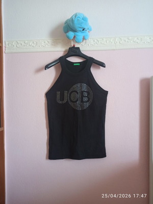 Benetton women's black top small like new with sporty back