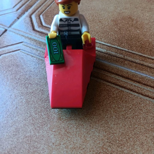 Lego set used with truck, helicopter, and motorcycle