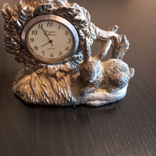 Table clock used with rabbit shape and analog dial