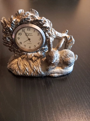 Table clock used with rabbit shape and analog dial