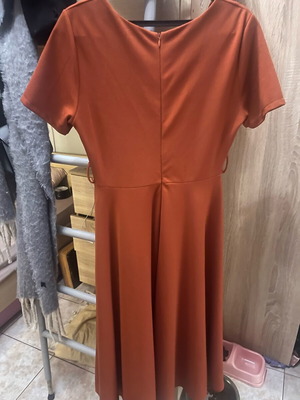 Dress one size long with fastening on the side, new