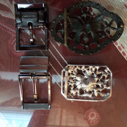 Four belt buckles