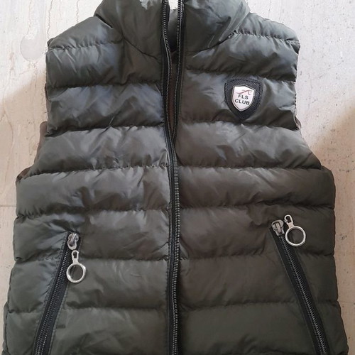 Windproof vest in excellent condition for ages 3 to 4, green