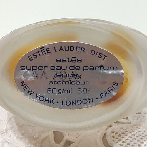 Dolce Gabbana and Estee Lauder colognes used, 2 empty bottles