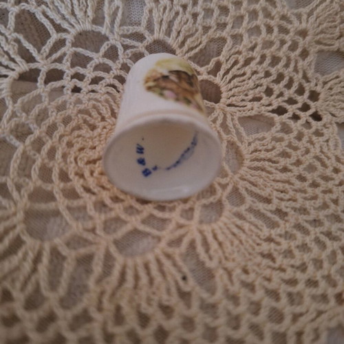 Porcelain thimble with rabbit, flawless and sealed