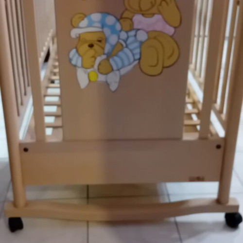 Baby cot Pierro like new with adjustable rails and storage drawer