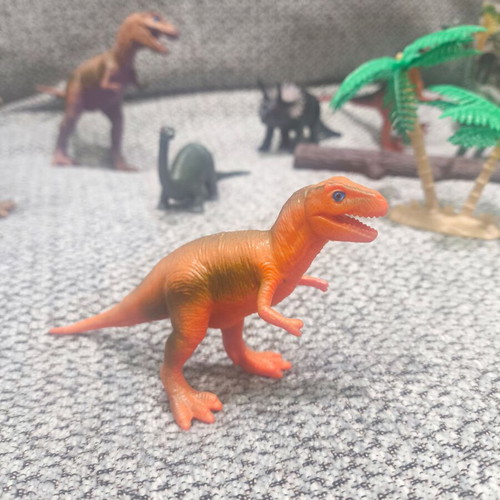 Dinosaur figure set like new, 9 figures with trees and sticks