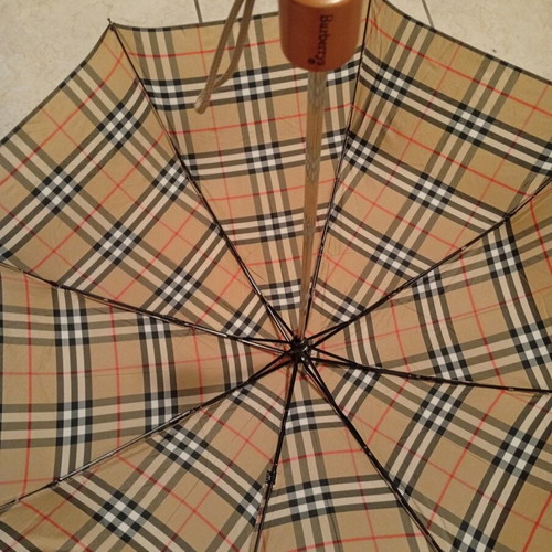 Burberry folding umbrella and Johnstones of Elgin cashmere scarf used