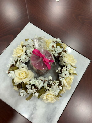 Decorative wreath with flowers and candle new