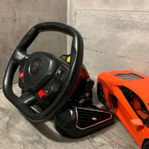 RC Lamborghini remote control car like new with steering wheel