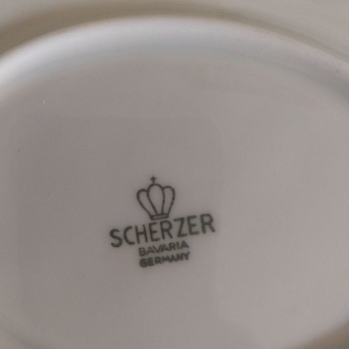 Porcelain like new, 2 Limoges salad bowls and 2 Sherzer platters