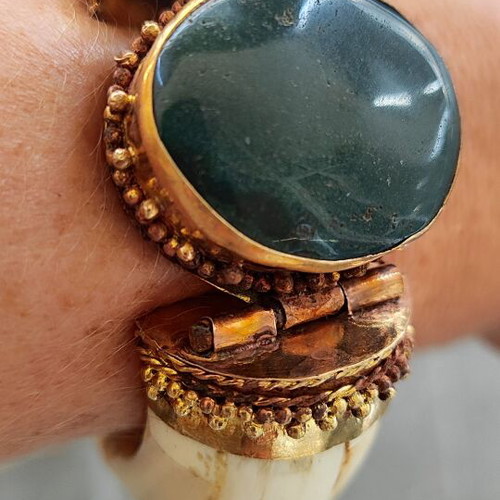 Vintage ethnic horn bracelet with green stone and bronze