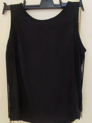 Black blouse with fringes used and black evening dress