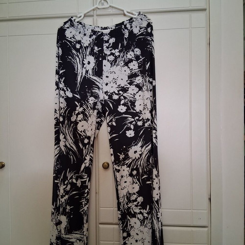 Black and white palazzo pants like new, sizes XL and XXL